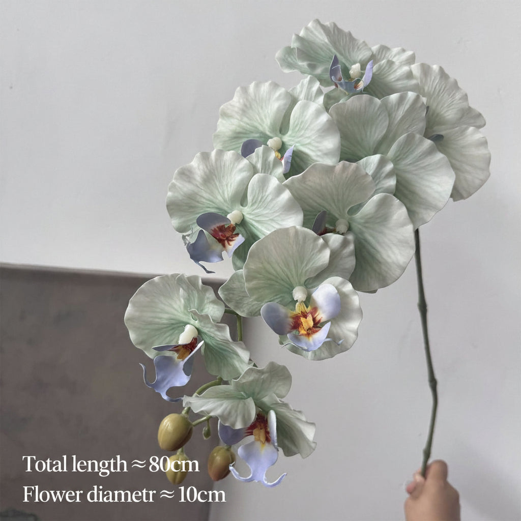 White artificial orchid bouquet for memorial table decor