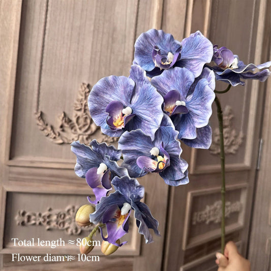 Lifelike artificial orchid petals for real touch versus silk flower comparison