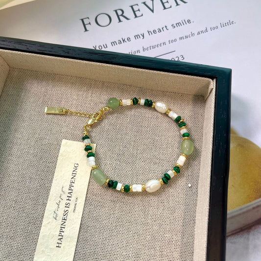 Aventurine and pearl bracelet in a tray