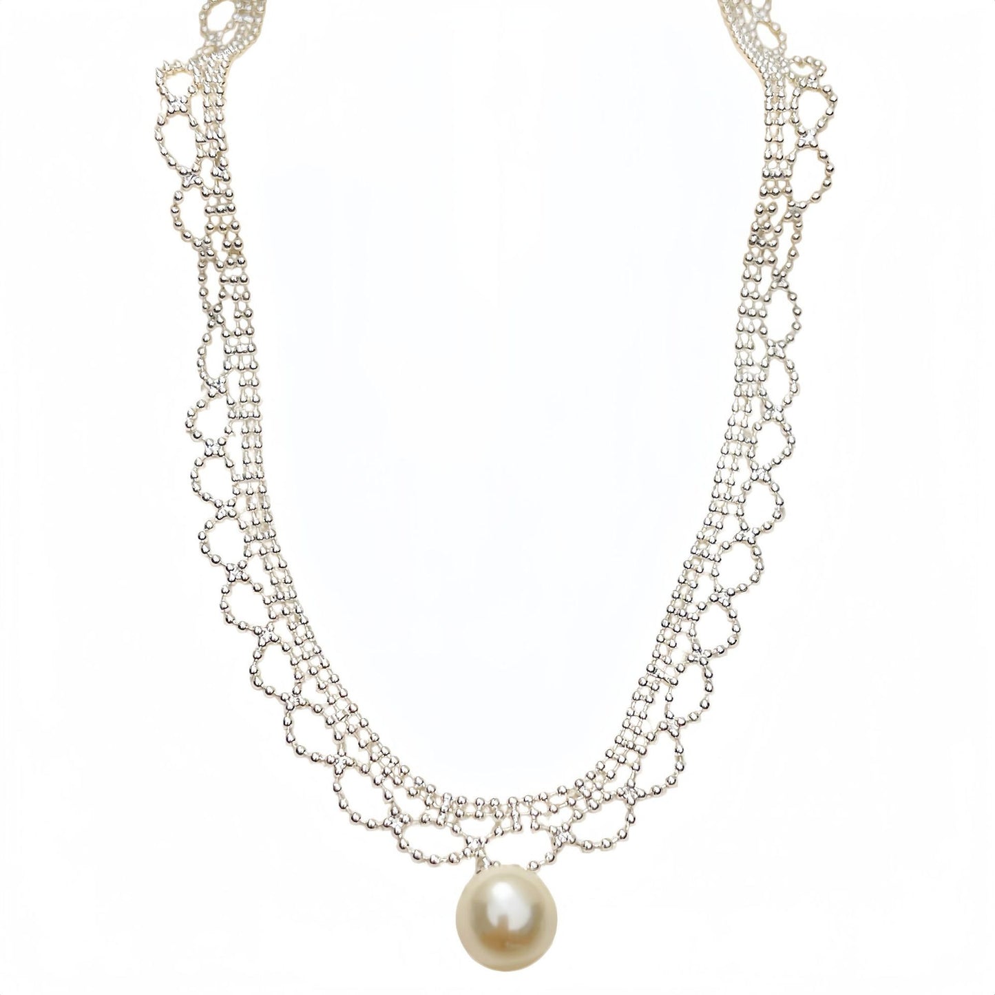Silver lace collar necklace with a single pearl drop, white background