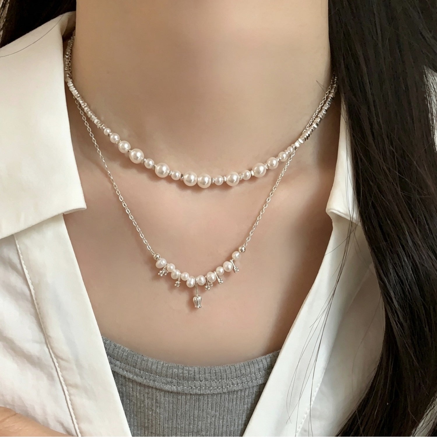 Pearl and silver-tone layered necklace with a tulip drop