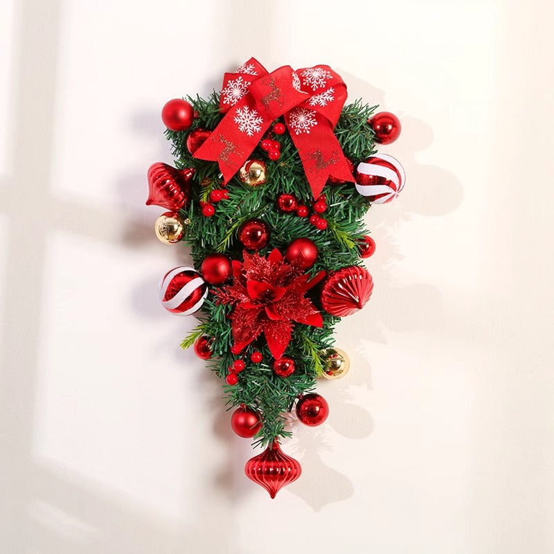 Holiday wreath and garland arrangement for wall decor