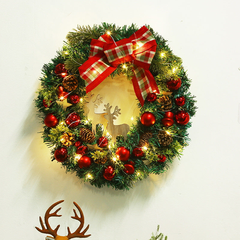 Holiday wreath and garland for festive front door decor