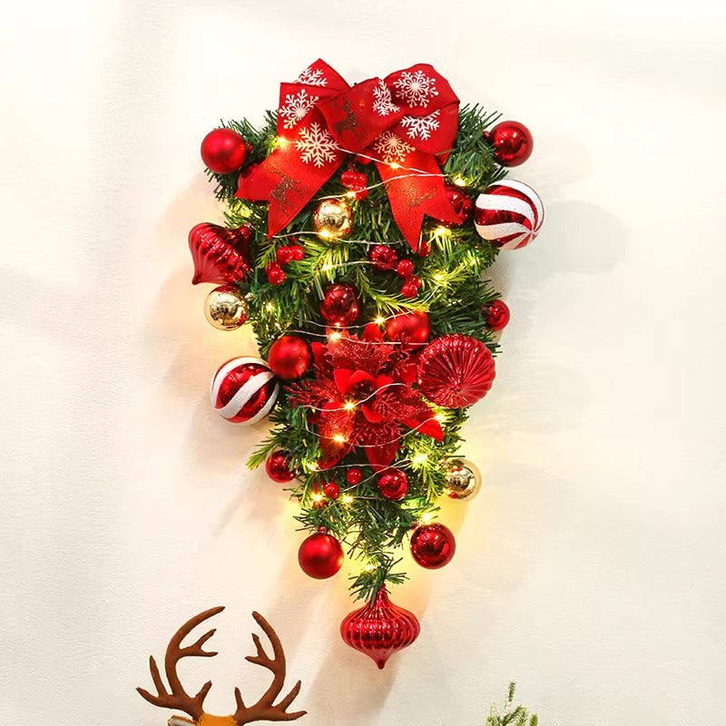 Christmas wall hanging with wreath and festive ornaments